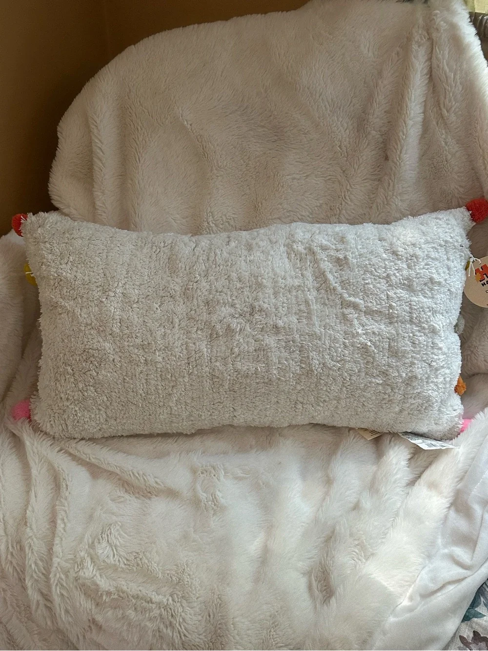 NWT Cozy Cream Sherpa Lumbar Pillow with Colorful Pom Trim
